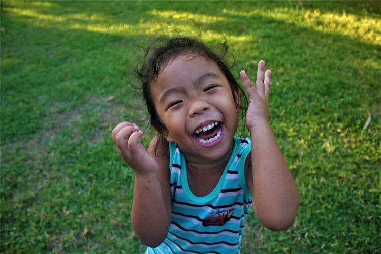 Photo Of A Girl Laughing