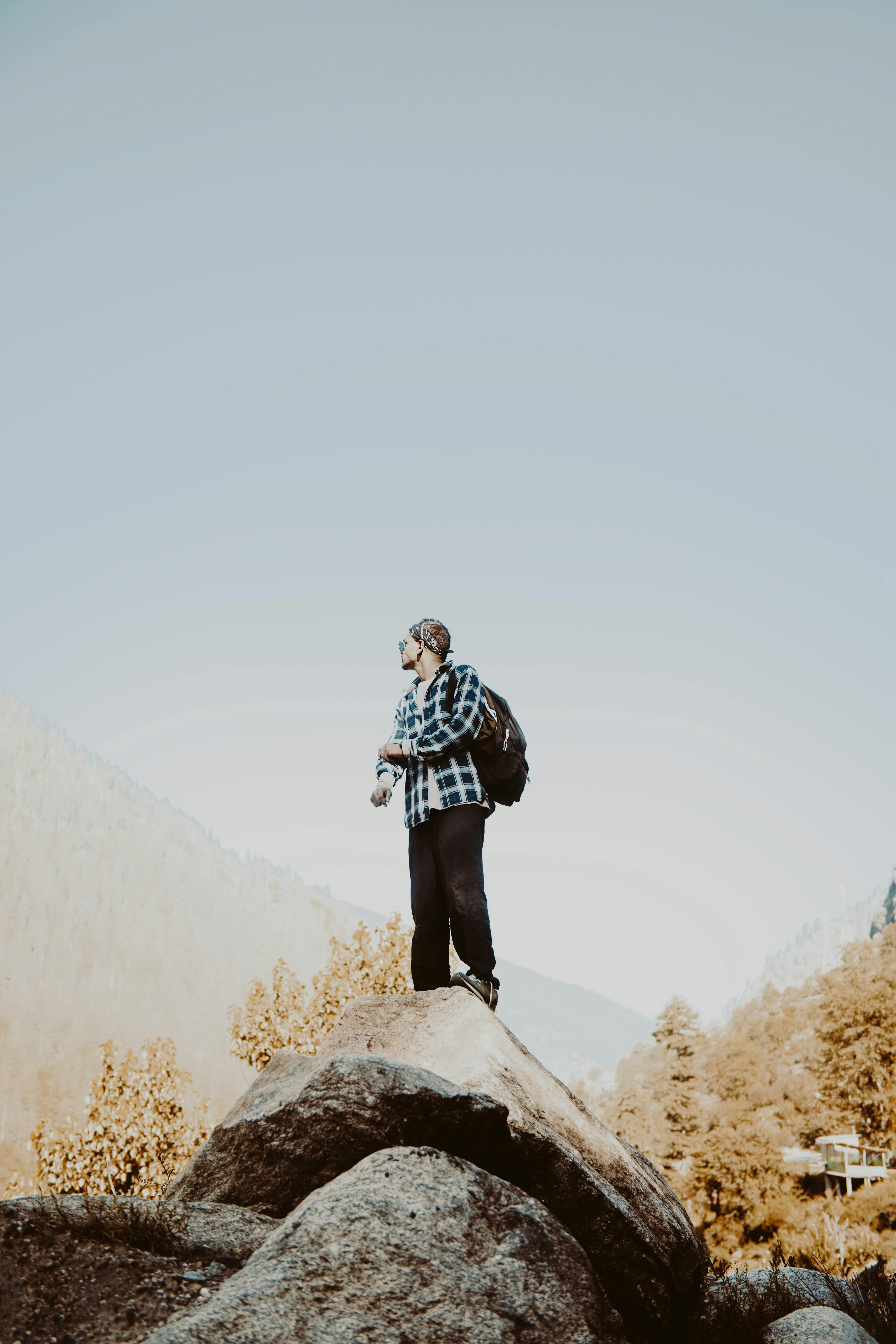 A Man Holding a Light Bulb · Free Stock Photo