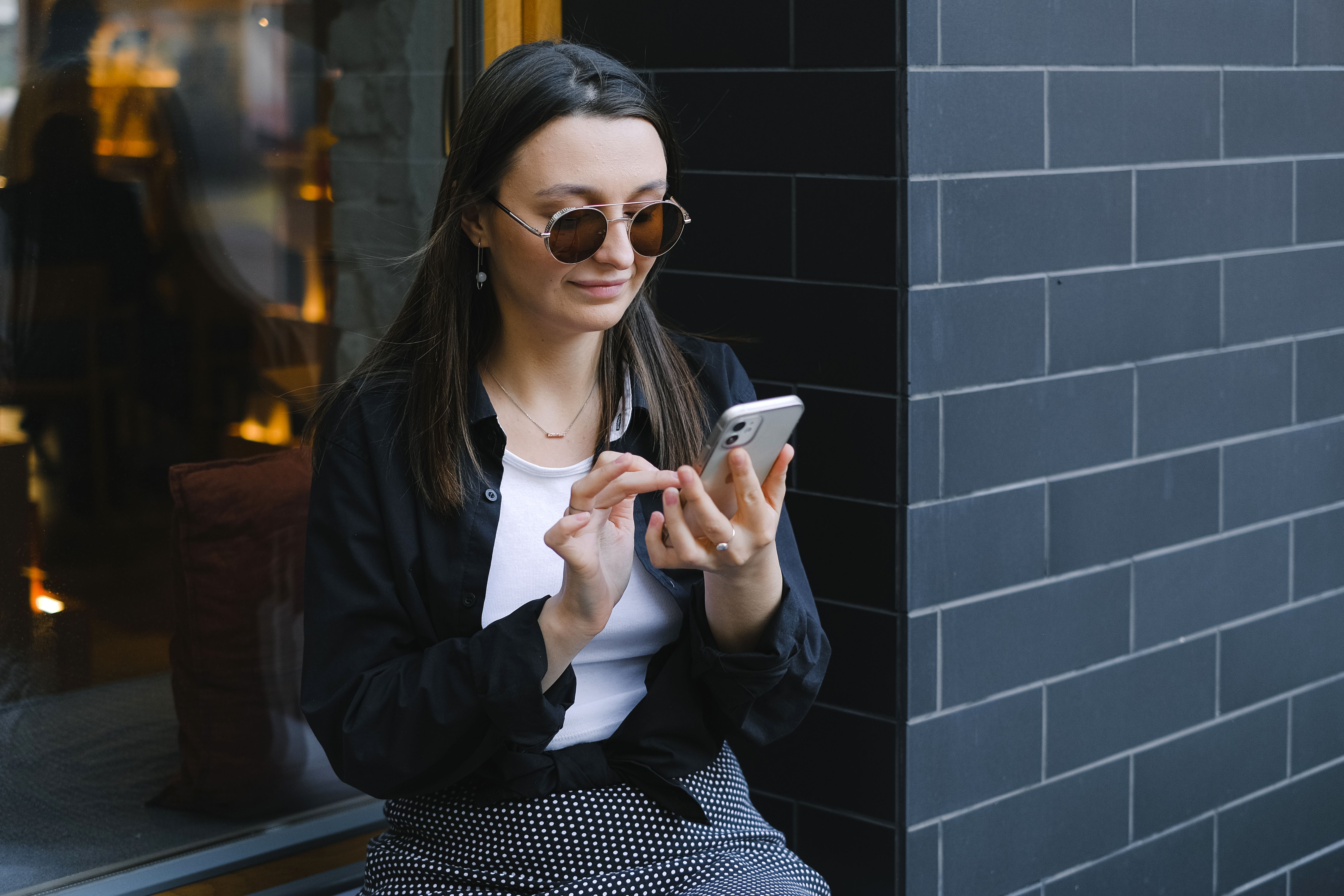Free Woman in Black Blazer Holding White Ceramic Mug Stock Photo