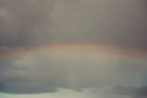 Free Rainbow on Gray Sky Stock Photo