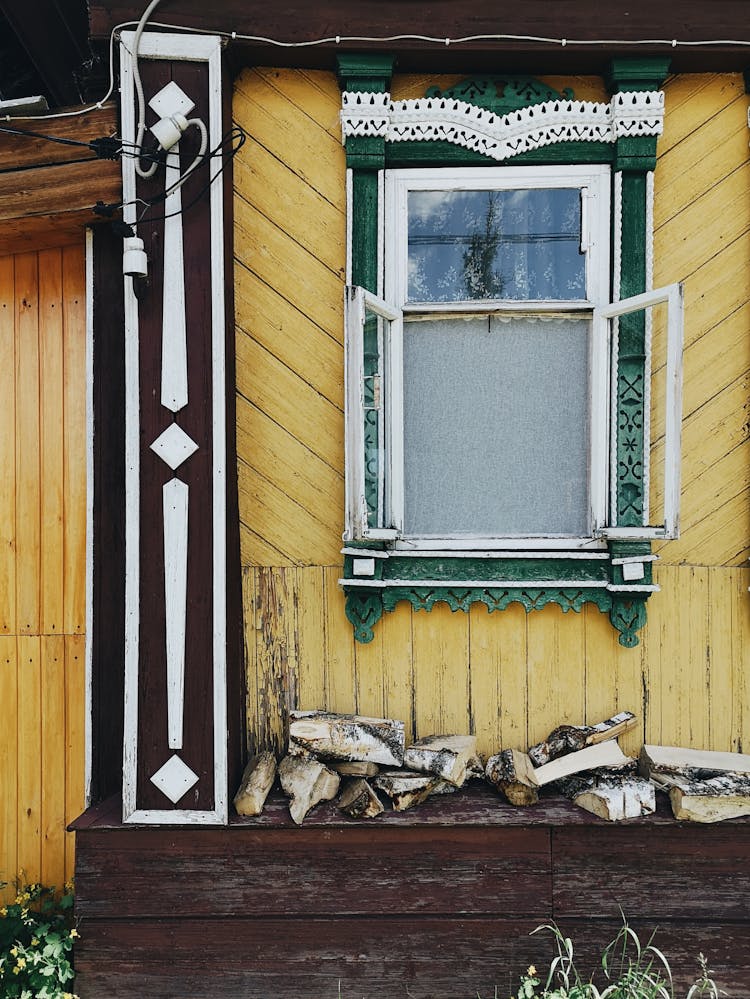 Old Village House With Ornamental Window Frame