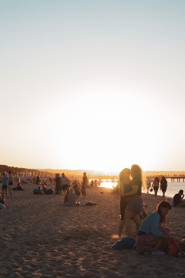 People On Beach During Sunset