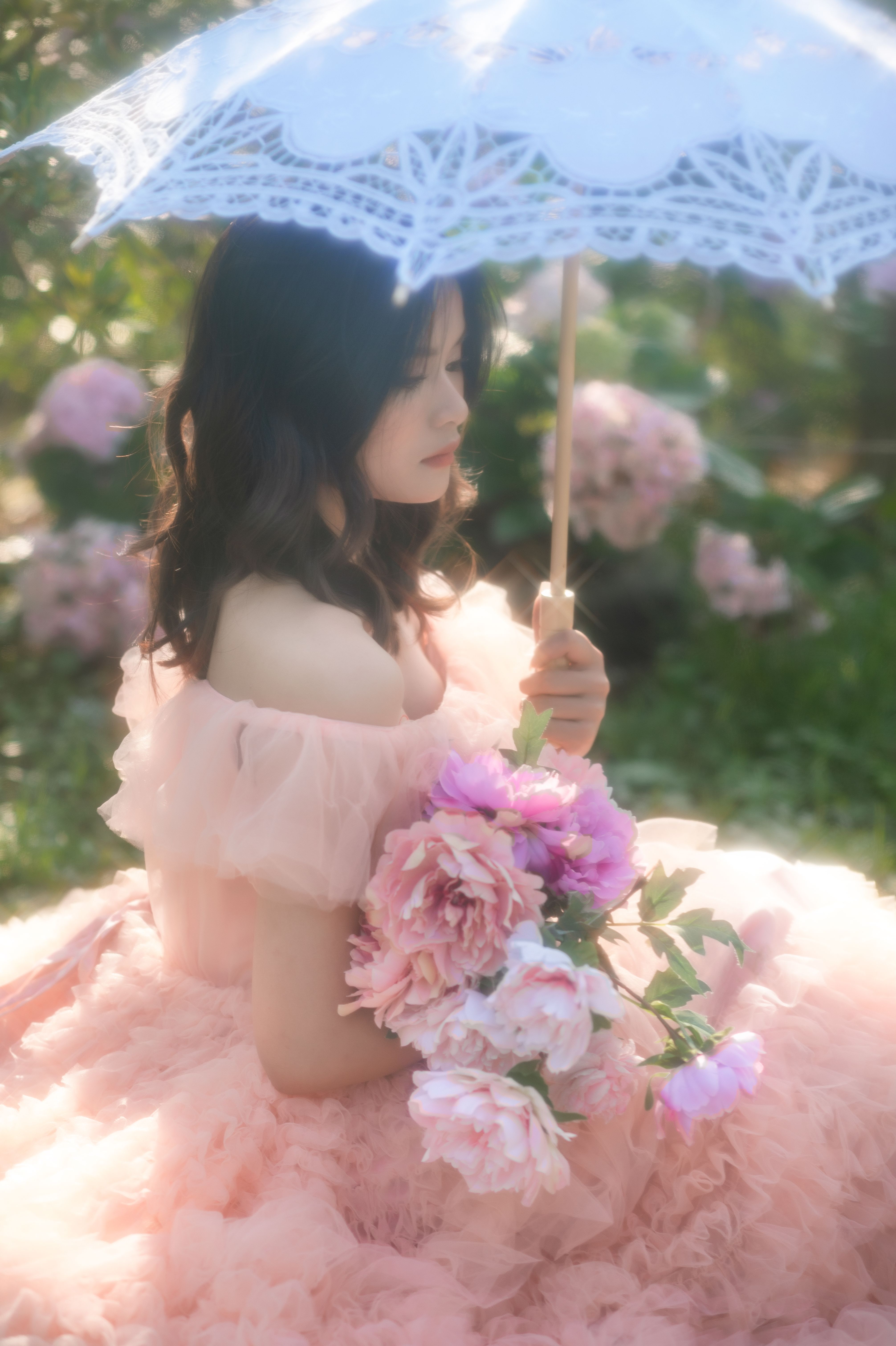 Woman in Pink Dress Holding an Umbrella · Free Stock Photo