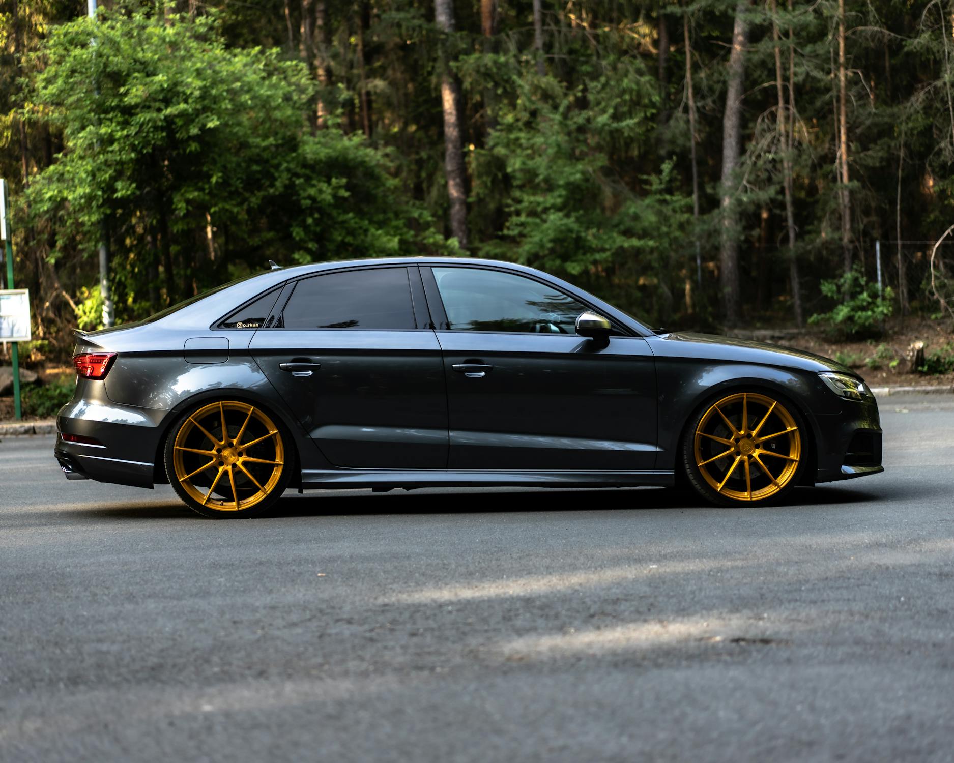 Black Car with Gold Rims Parked on the Road · Free Stock Photo
