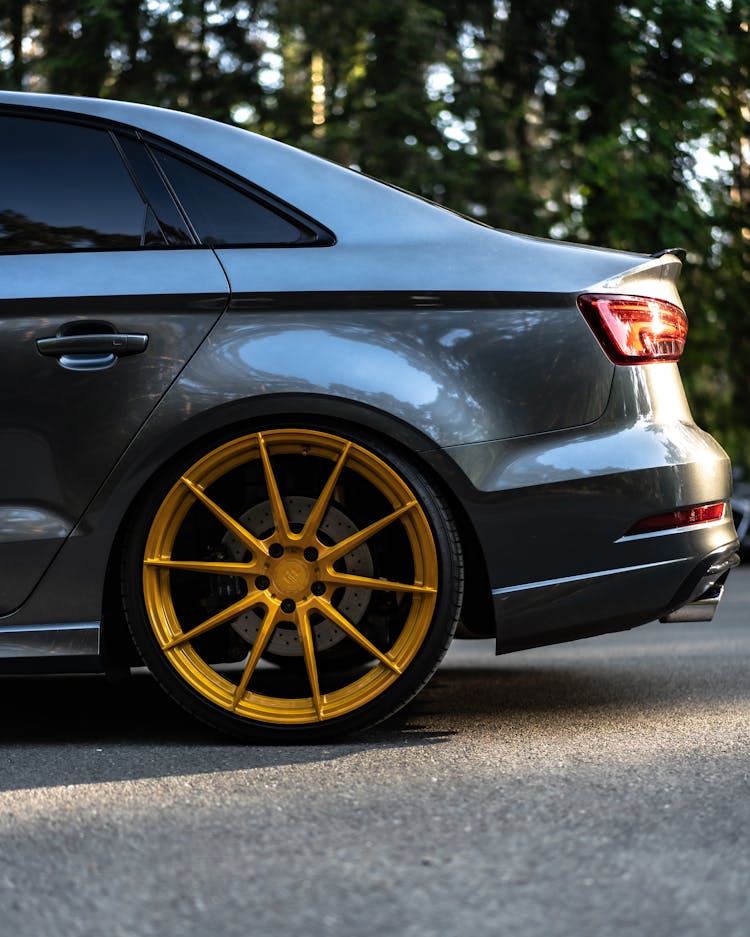 Gold Rim Of A Black Car