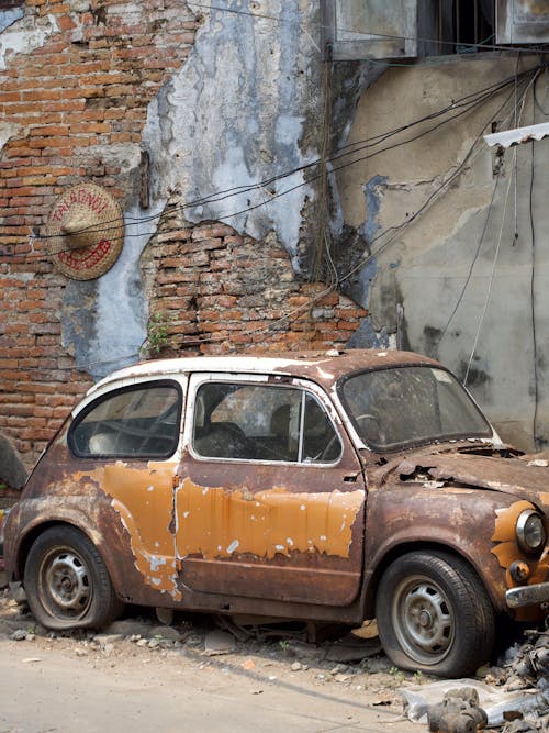 Old Abandoned Car on Decay Street