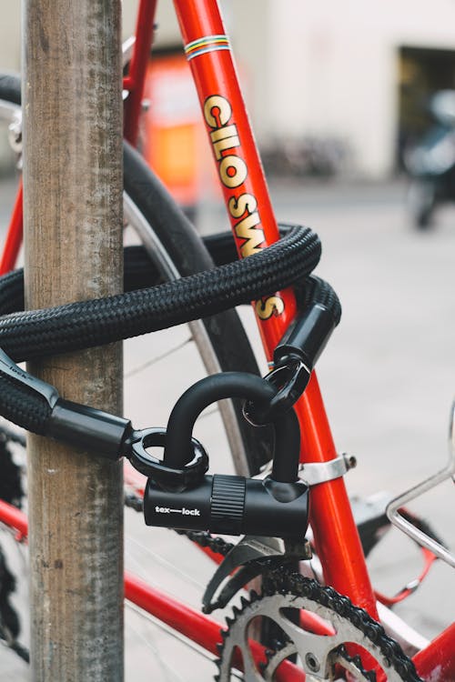 Red Bicycle With Black Lex-lock Cable