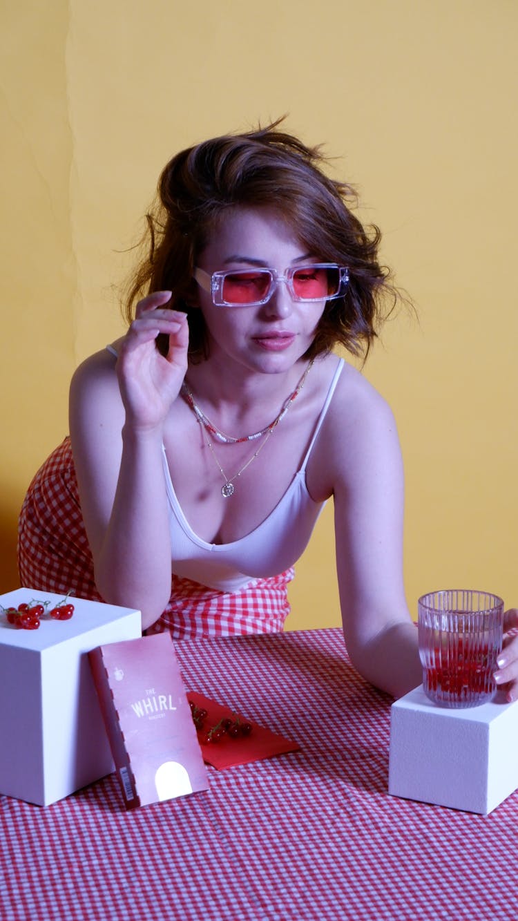 Young Woman In Red Sunglasses 