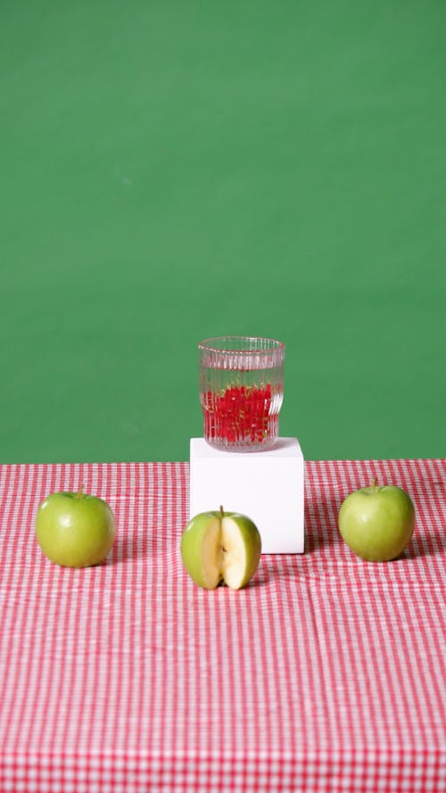 Still Life with Green Apples on a Checked Tablecloth