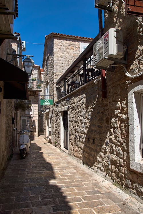 Sunny Old Town Street with Stone Houses
