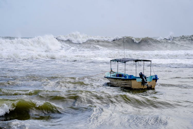 Boat In Sea In Storm