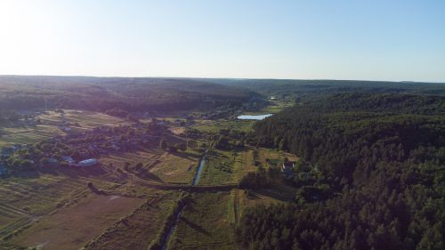 Free Scenic aerial view of the countryside with fields, forests, and a clear sky in Lviv, Ukraine. Stock Photo