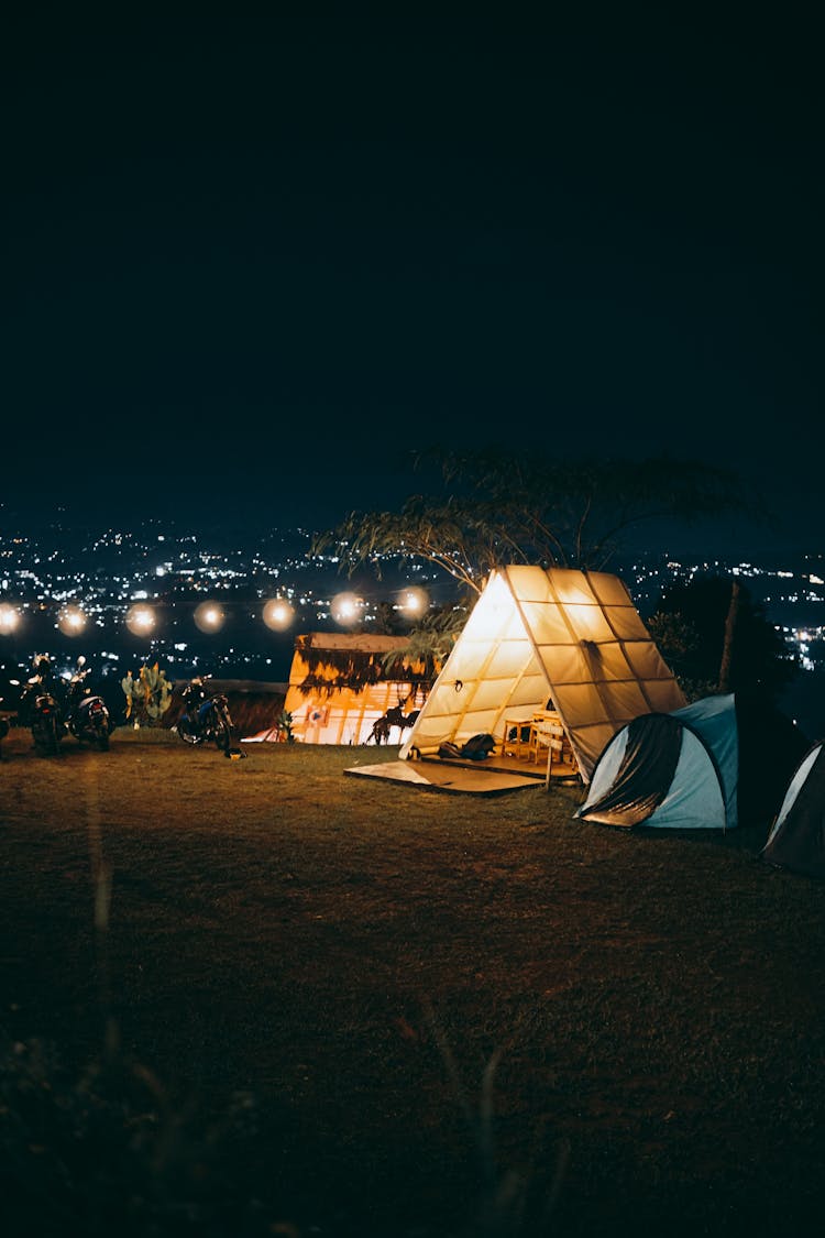 Illuminated Tent Outdoors At Night