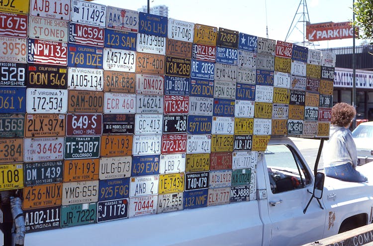 Multiple Licence Plates Displayed On A Van 