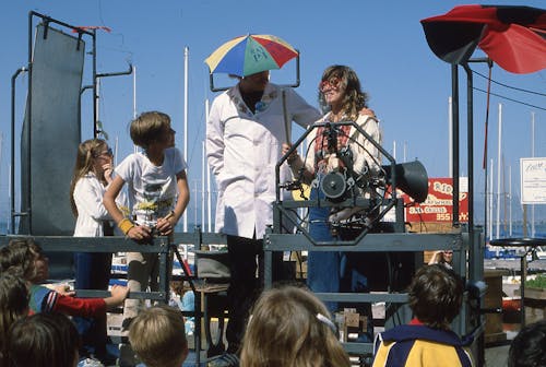 People Entertaining Children on a Festival 