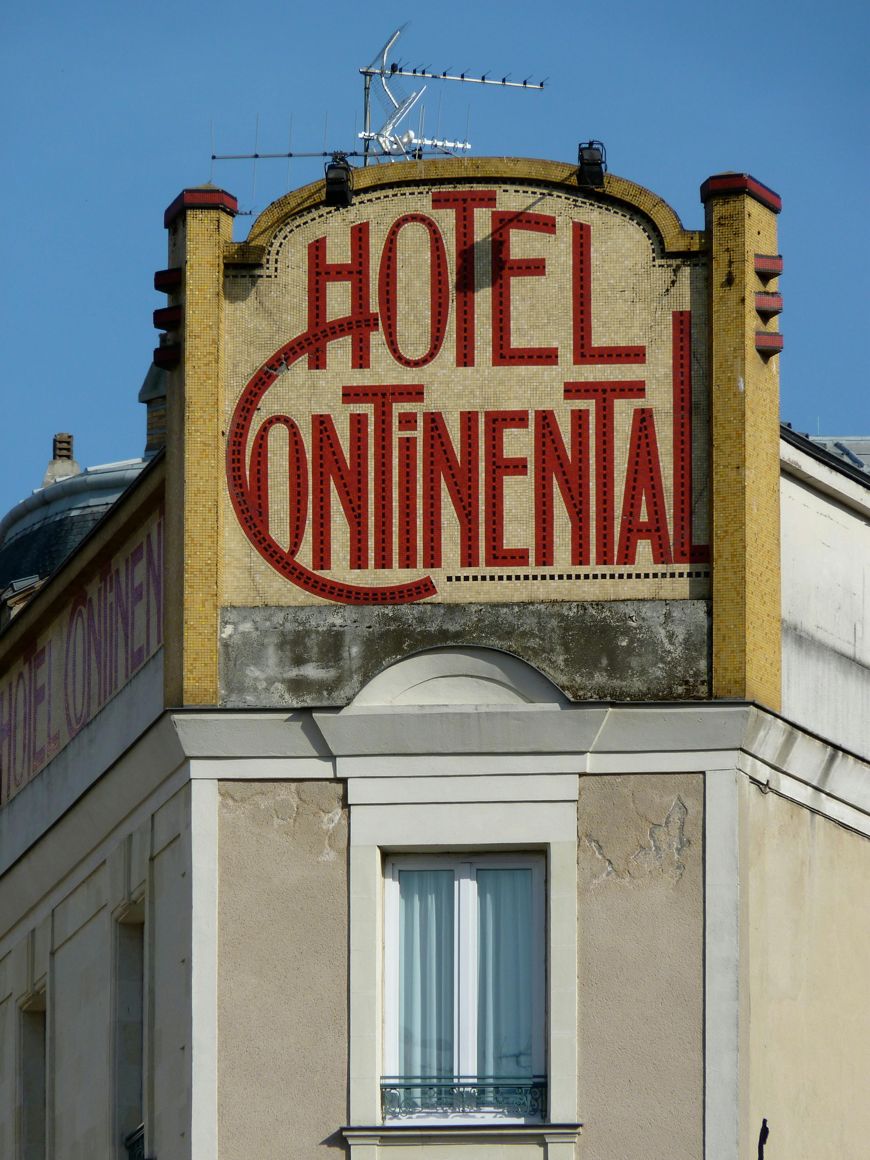 Close-up of the Hotel Continental's art deco sign in Angers, France.