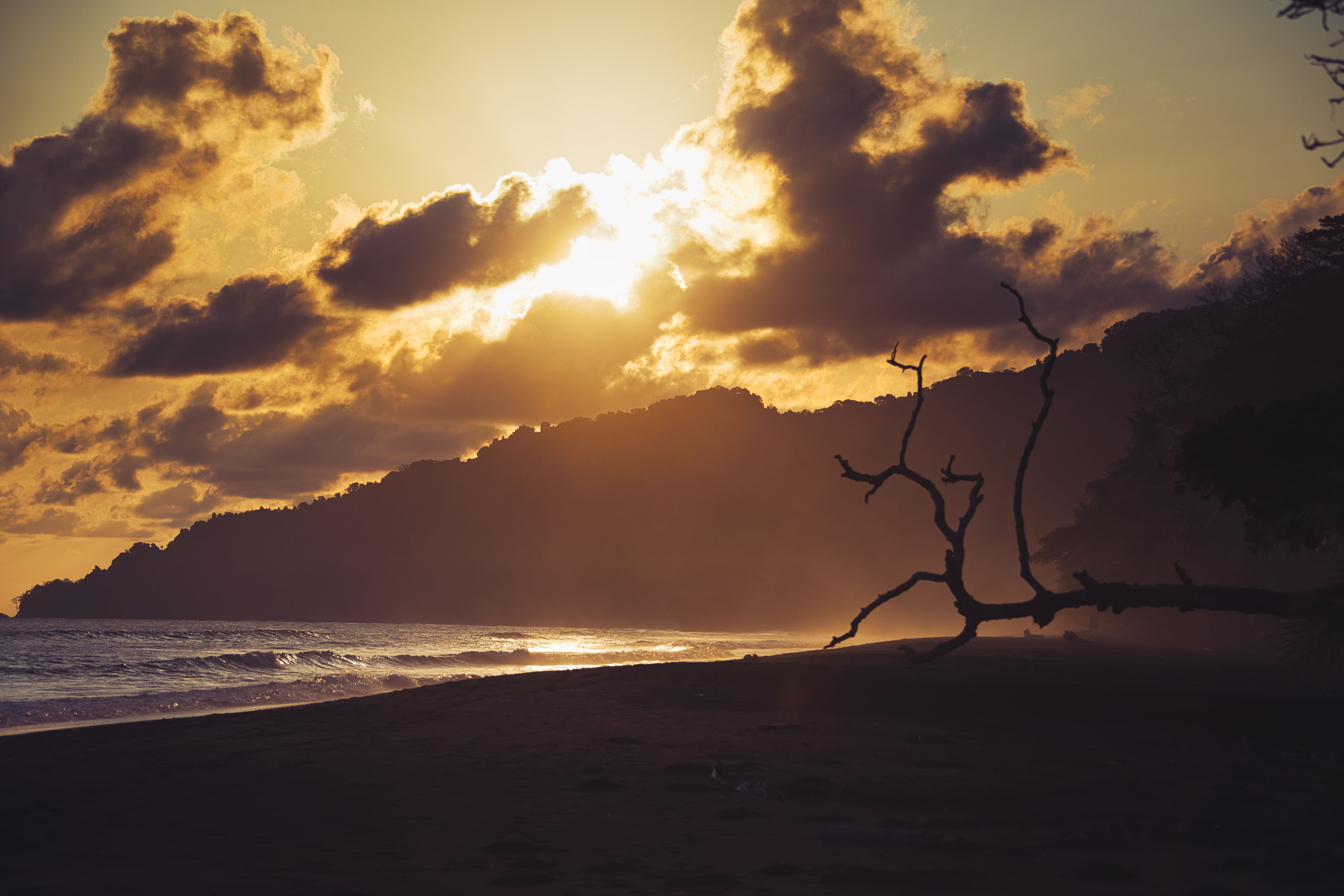 Sunset at Pacific beach with dramatic clouds