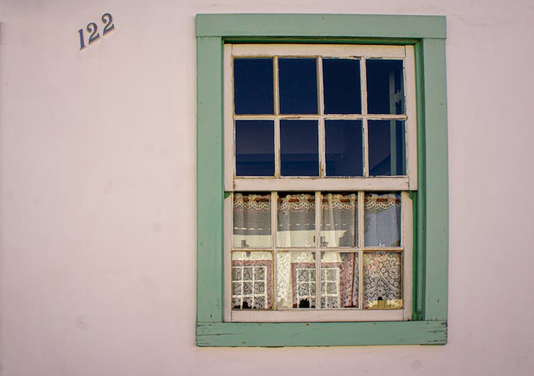 Window On Wall Near Number 122