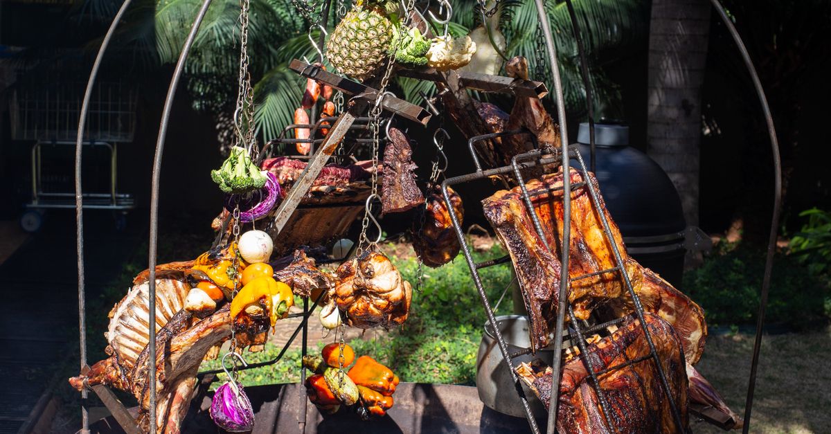 Food Installation Food Installation Hanging over a Grill · Free Stock Photo