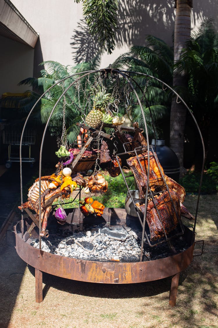 Food Installation Hanging Over A Grill