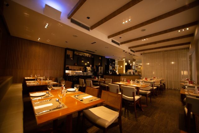 Set tables in a restaurant dining room