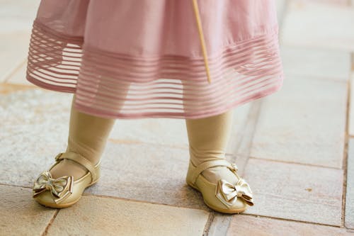 Close-up of Little Girl in a Dress 