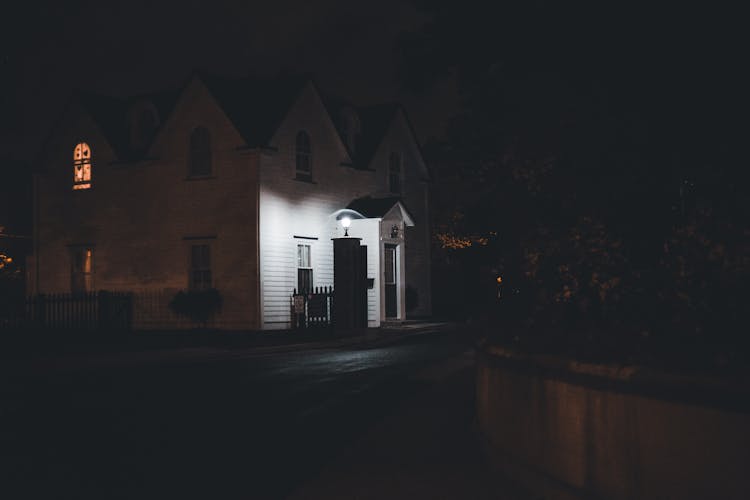 Illuminated House During Night Time