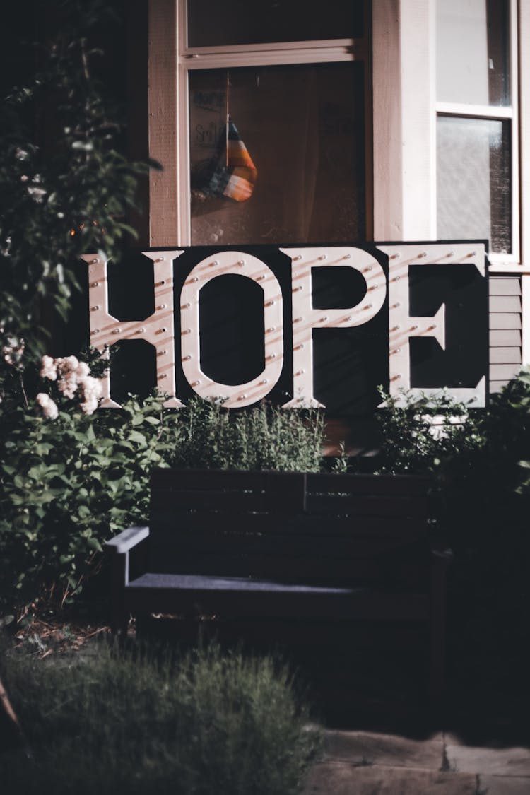 Photo Of A Garden With Sign Saying Hope