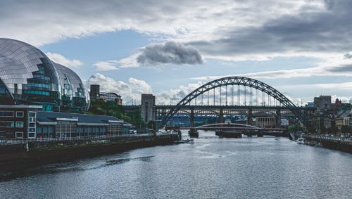 Free View of iconic bridges and contemporary architecture along the River Tyne in Newcastle. Stock Photo