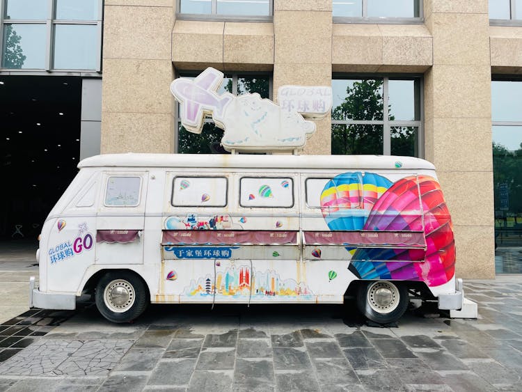 Colorful Van Near Building