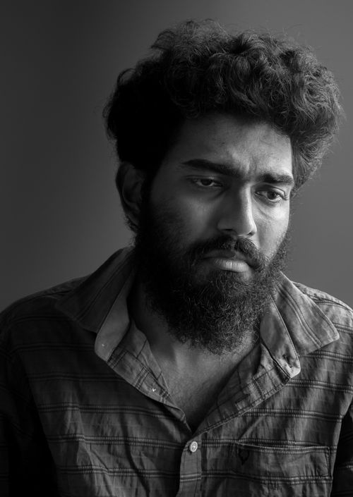 Free Black and white portrait of a thoughtful man with beard, conveying emotion. Stock Photo