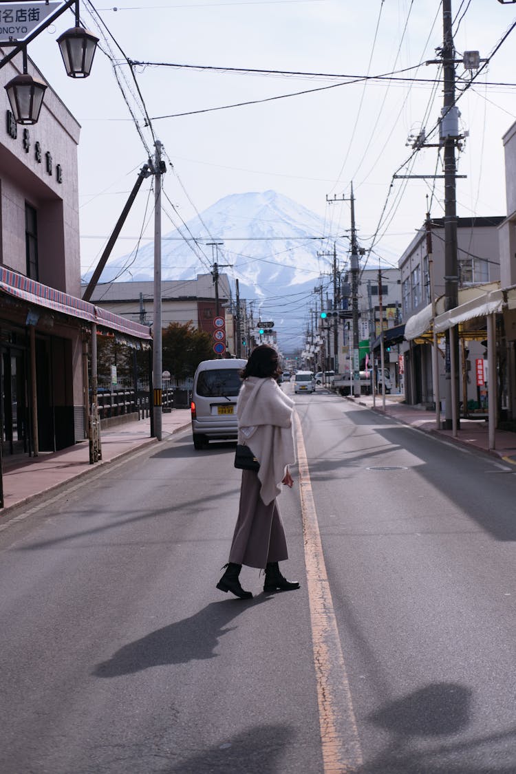 A Woman Crossing The Road