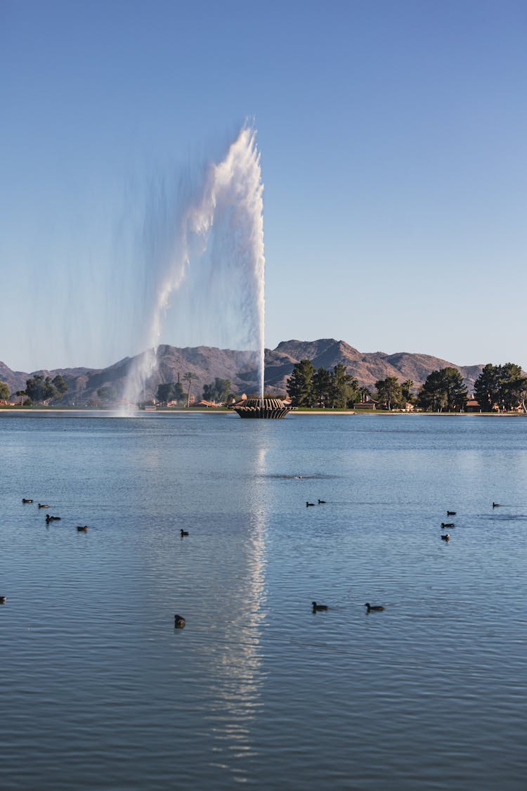 Fountain In Water In Nature Park