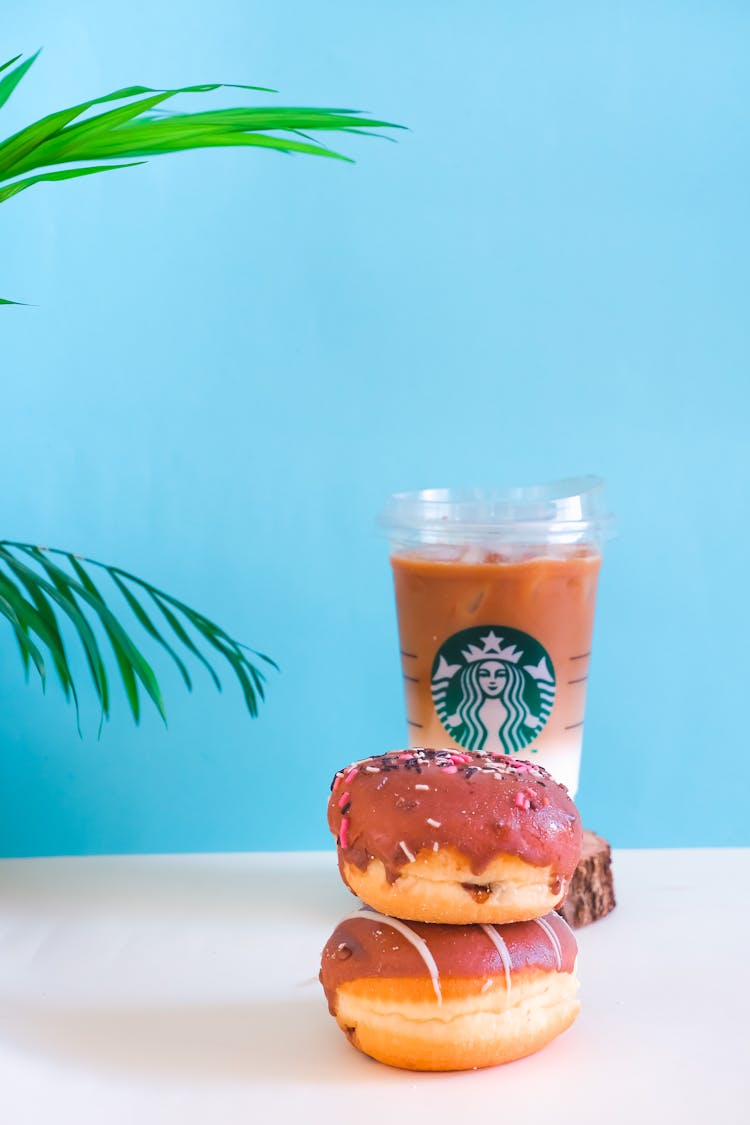 Stacked Doughnuts And Iced Coffee