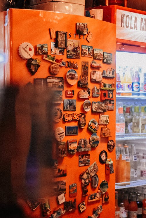 Variety of Magnets on a Refrigerator