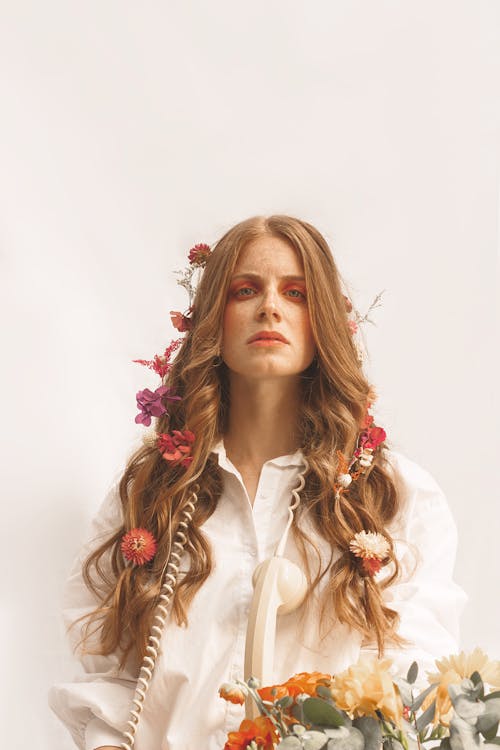 Beautiful Woman with Flowers in Hair