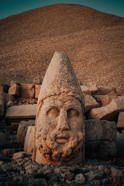 Free Explore the ancient stone head sculpture on Mount Nemrut in Adıyaman, Turkey. Stock Photo