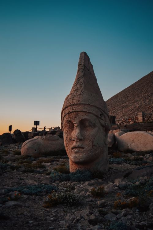 Free Famous head sculpture at Mount Nemrut, Adıyaman, Turkey during dusk. Stock Photo
