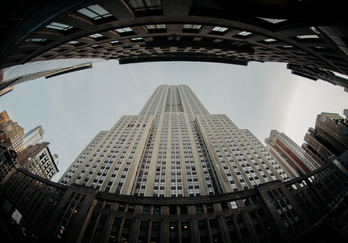 Dramatic fisheye view of the iconic Empire State Building in New York City.