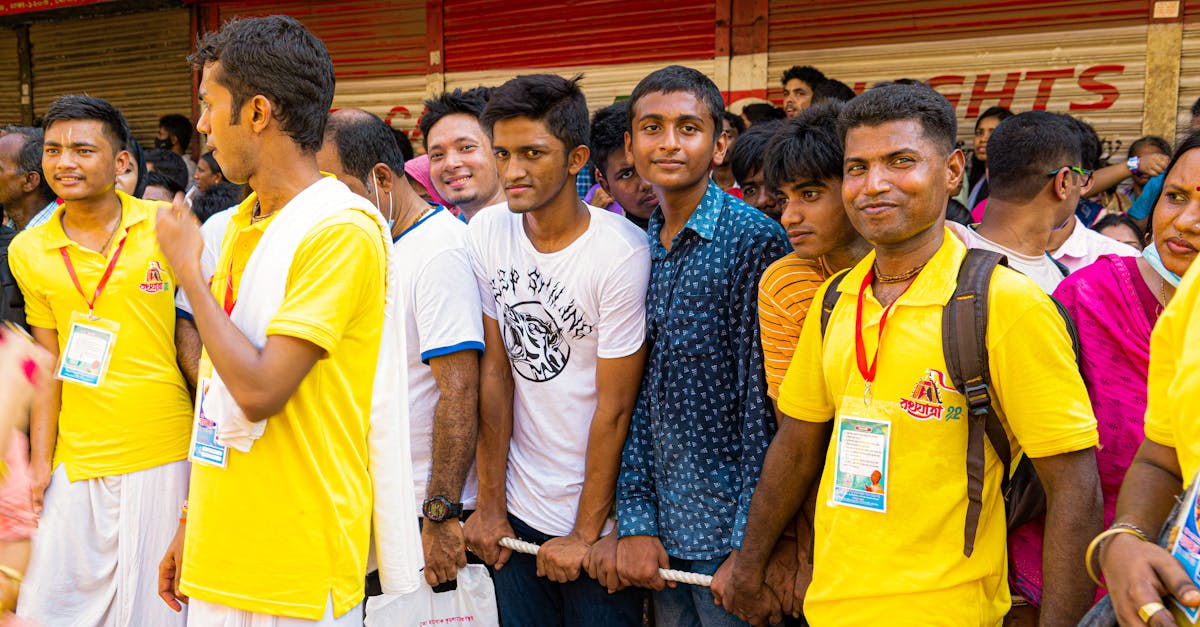 A vibrant crowd gathered in Dhaka for the Ratha Yatra festival, showcasing local culture.