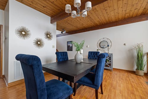 Wooden Dining Table with Blue Chairs