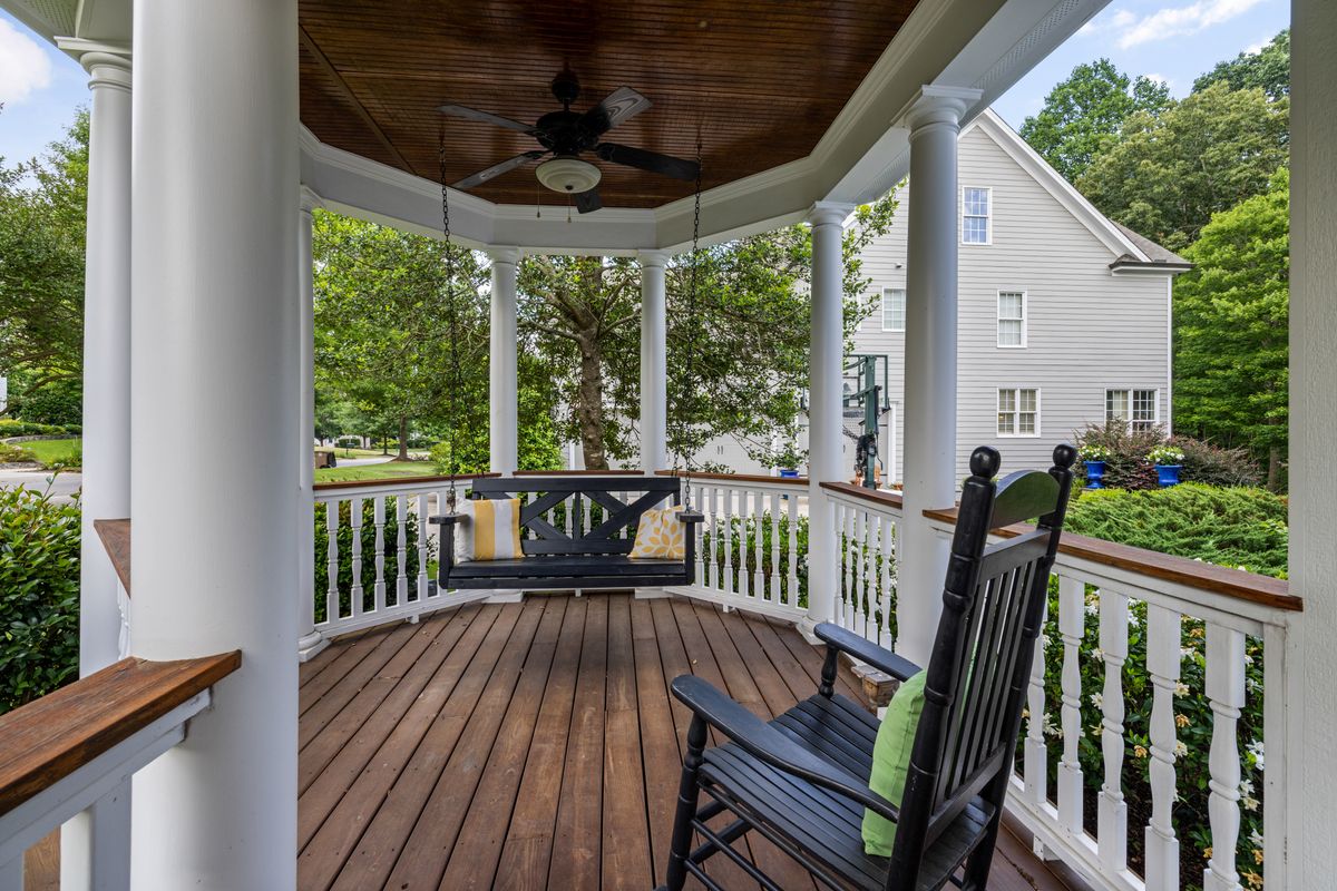 Quiet porch with a rocking chair and hanging swing