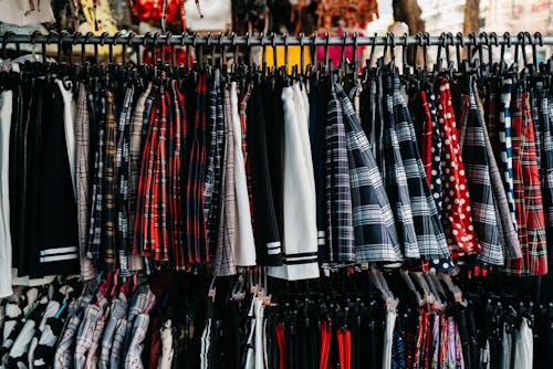 Free Assorted Clothes Hanged on Clothes Rack Stock Photo
