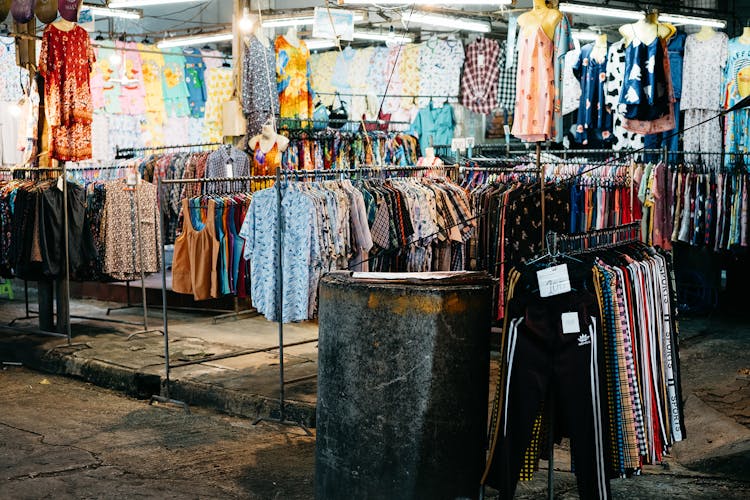 A Variety Of Clothes At A Clothing Store