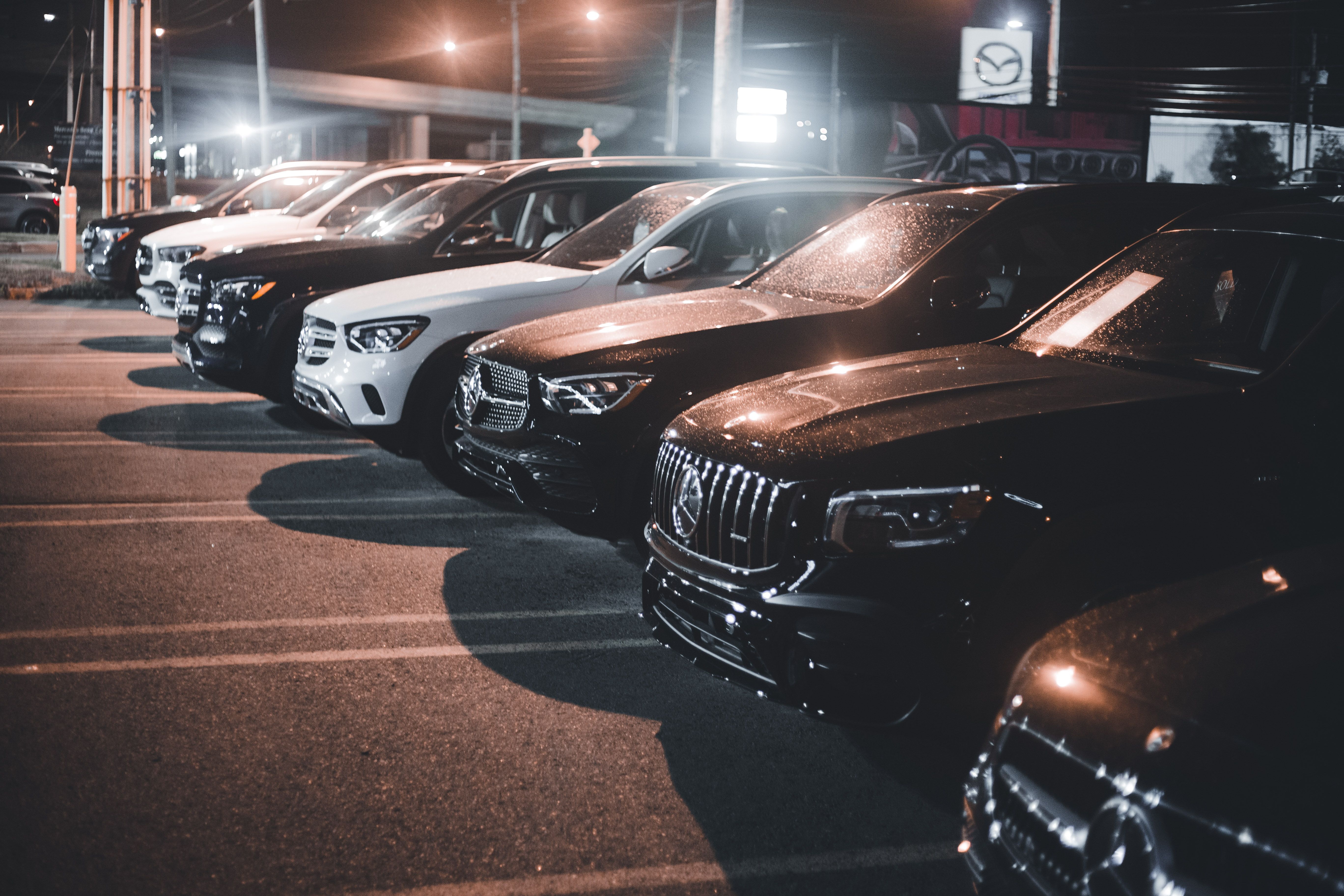 Image Name well-lit commercial parking lot with outdoor lighting for safety and visibility at night