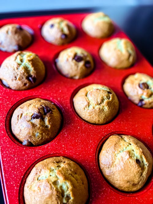 Delicious Brown Cookies on Red Baking Tray