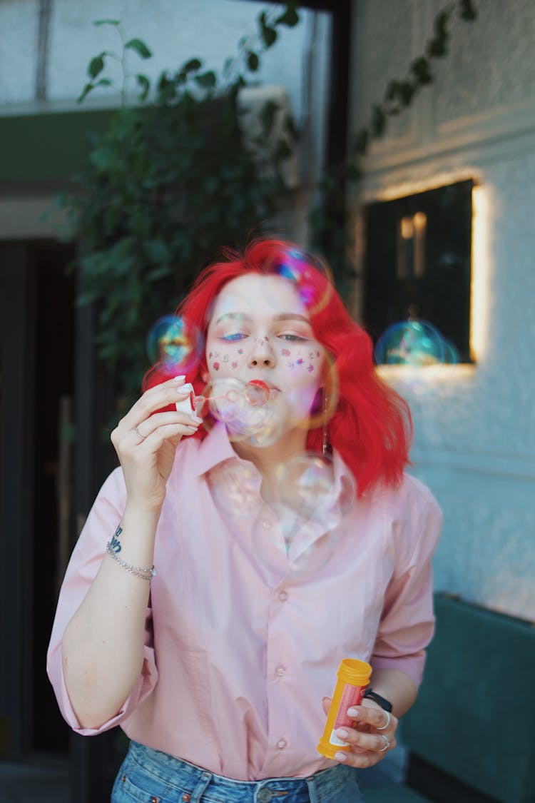 Woman Blowing Soap Bubbles