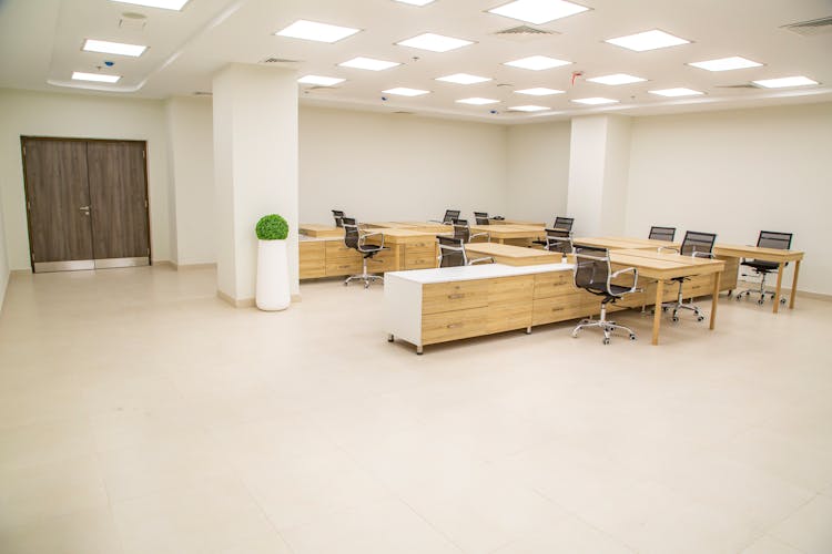 Desks And Chairs In An Aerial Office 