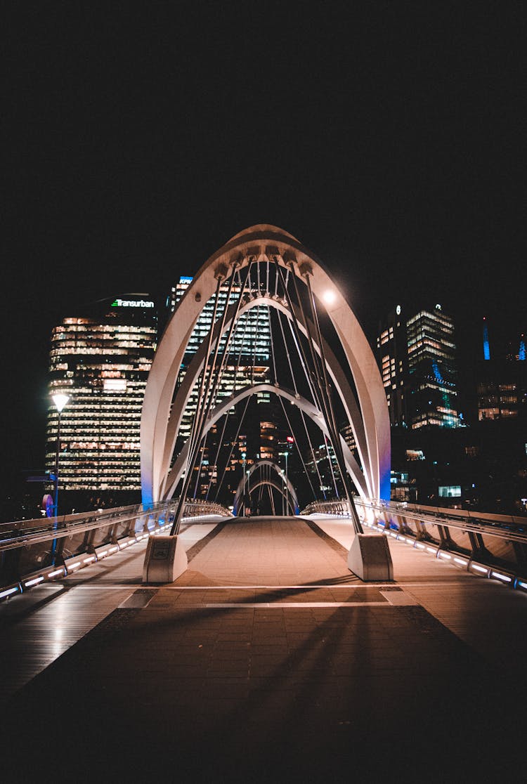 Illuminated Footbridge At Night