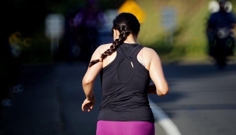 Back View Of Woman Jogging